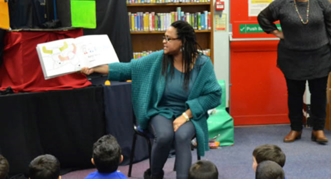 Severine, reading to children.